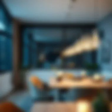 Dining area illuminated by stylish dangling LED lighting