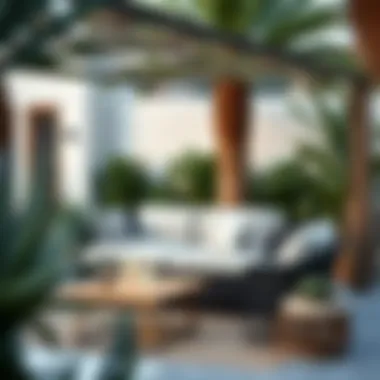 Stylish Outdoor Arrangement Stylish outdoor arrangement featuring the black rattan loveseat with cushions
