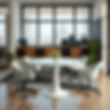 Tall round white table as a centerpiece in a modern workspace