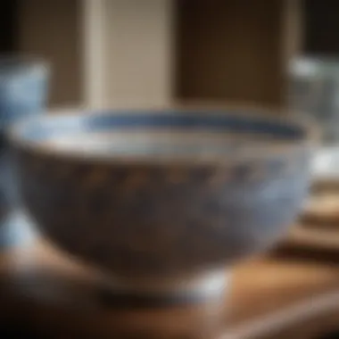 An elegant ceramic bowl with intricate patterns, highlighting artistry in kitchen essentials.