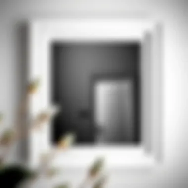 Close-up of a 12 x 24 white frame adorned with black and white photography